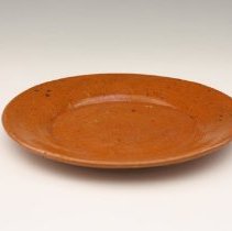 Saucer, orange by unknown